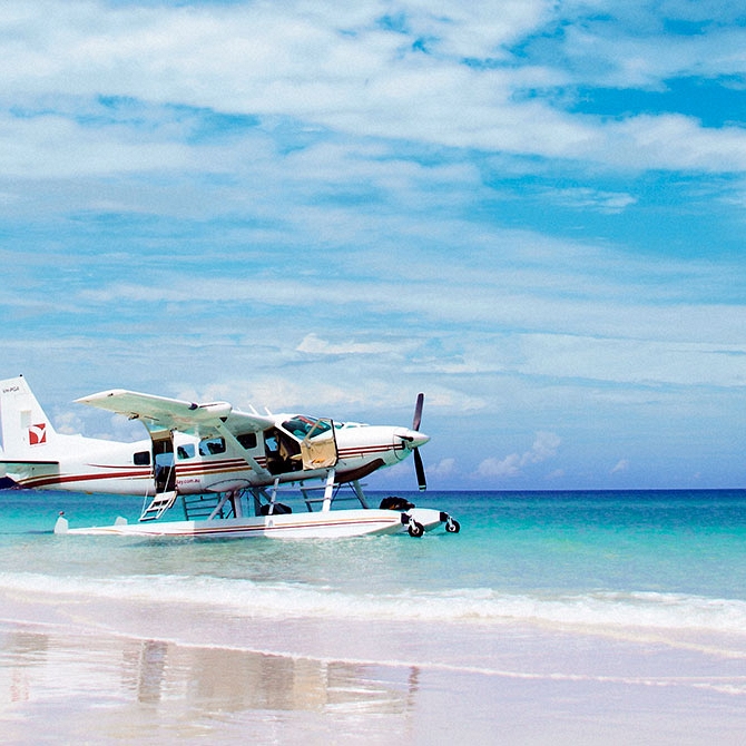 Seaplane Landing on Whitehaven Beach, Great Barrier Reef, Australia