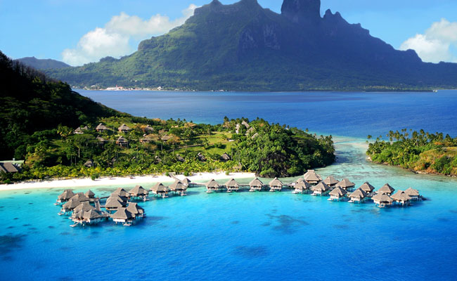 Over water bungalows - Hilton Moorea - Best Places to See in French Polynesia -Society Islands Travel Guide - Society Island Places to Visit