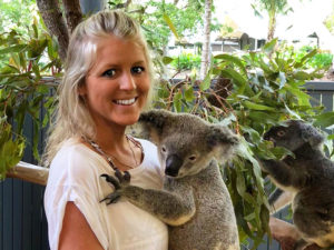 Cuddling a koala at Wildlife Habitat Port Douglas - Vanessa Massey, luxury travel designer