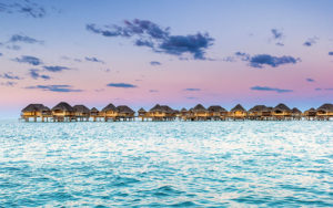 Overwater Bungalows at Sunset - Le Taha'a Resort