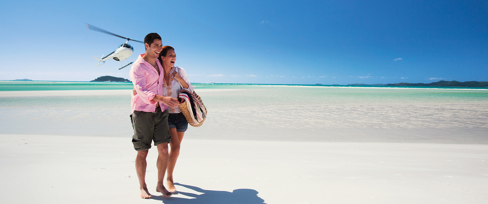 Couple on Whitehaven Beach, Australia - Bucket List Vacations - Australia, New Zealand, Fiji, Tahiti, Cook Islands Luxury Travel Agency