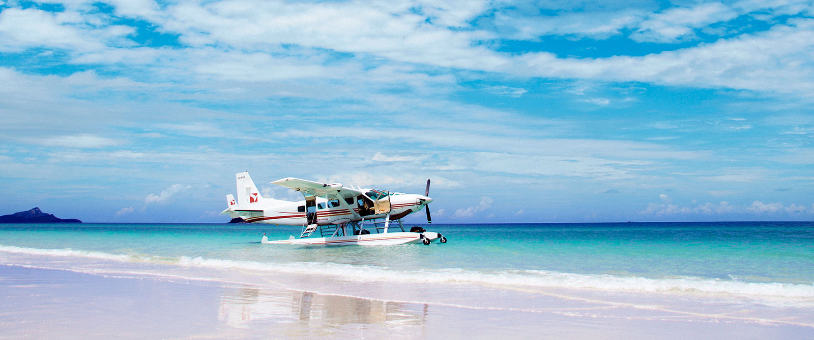 Seaplane Landing on Whitehaven Beach, Great Barrier Reef, Australia